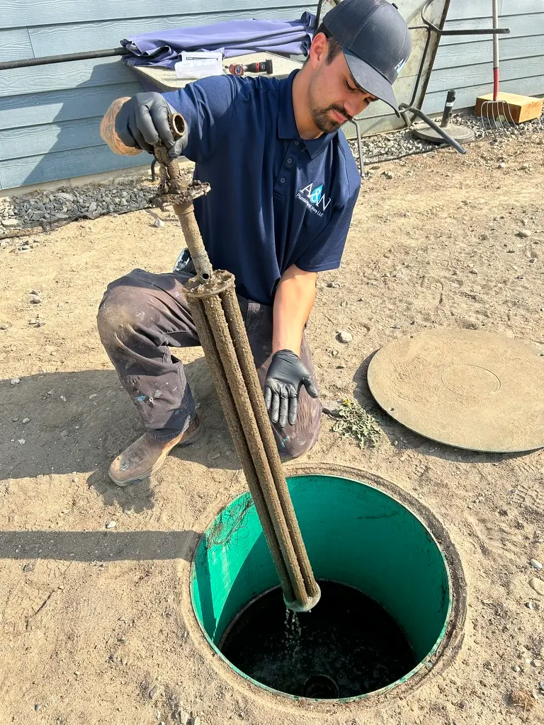 Pooling water in a yard that required septic services in Wenatchee, WA