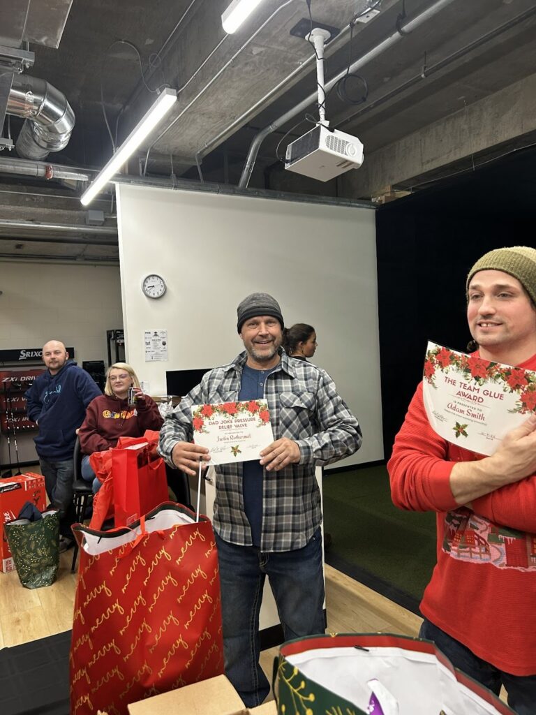 Holiday party setting during winter holiday hosting, illustrating how increased food cleanup can lead to garbage disposal clogs.