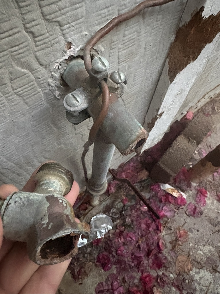 Heavily corroded pipe fitting showing the kind of damage hard water and aging plumbing cause in Scottsdale, AZ homes.