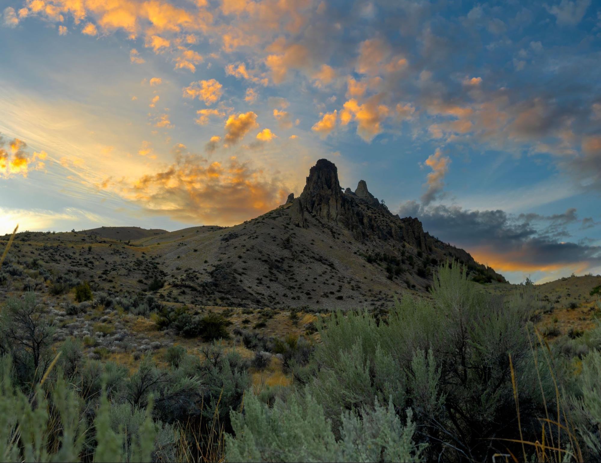 Rocky sunset ridgeline above Wenatchee, WA, where A&N Plumbing provides sewer camera inspection.