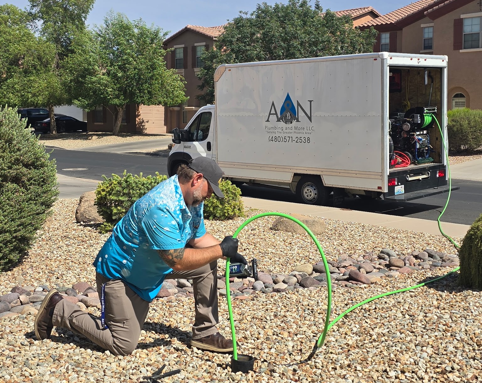 A&N Plumbing technician at a cleanout for a Scottsdale, AZ home.
