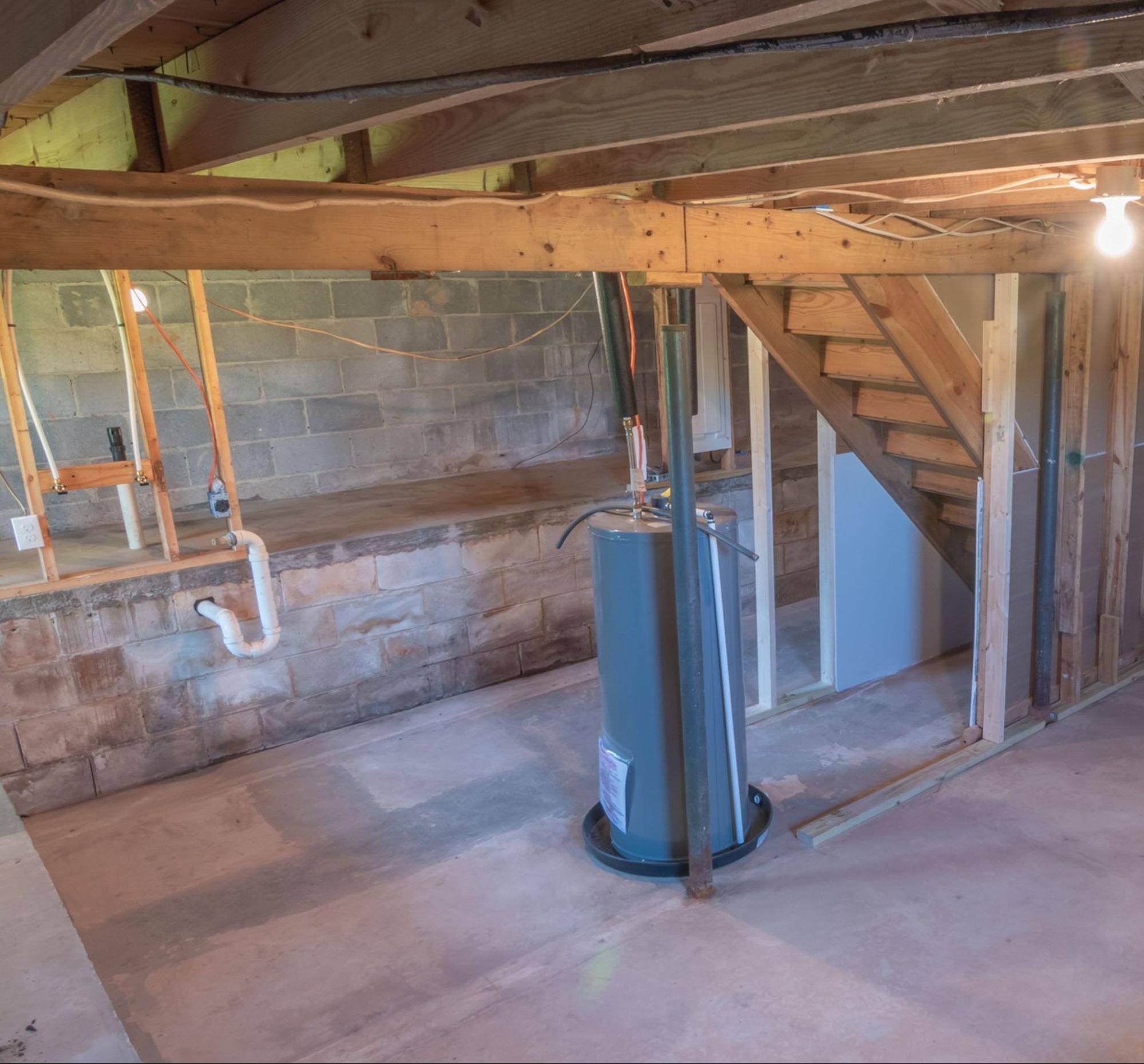 Gas hot water tank installed in the basement of an East Wenatchee, WA home.
